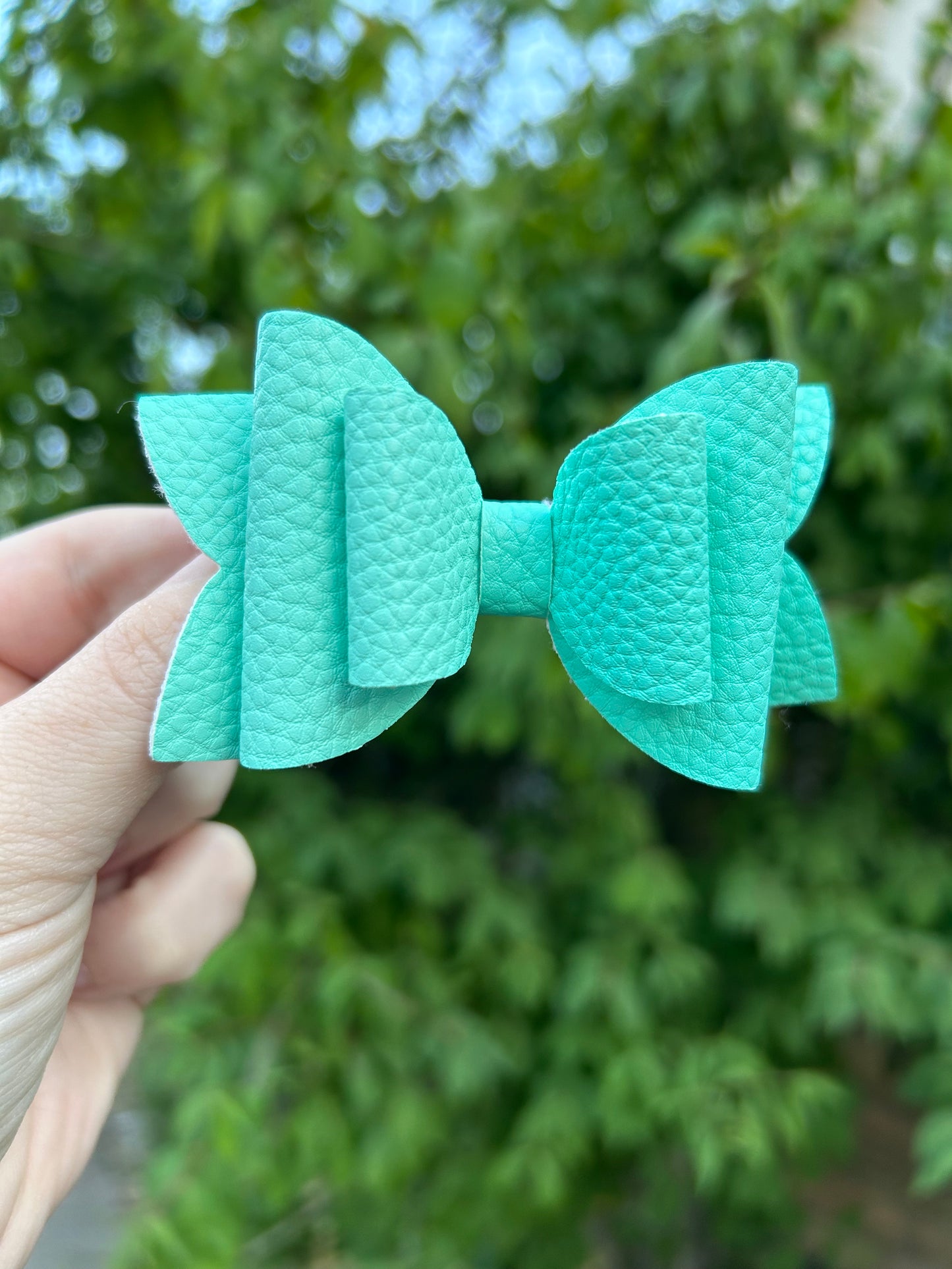 Teal Pebbled Faux Leather Bow